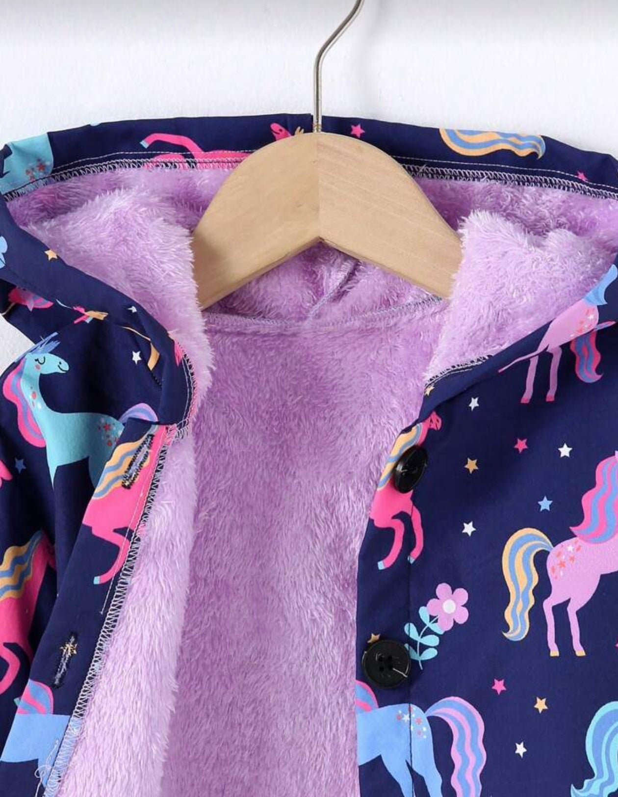 Cardigan morado con unicornio